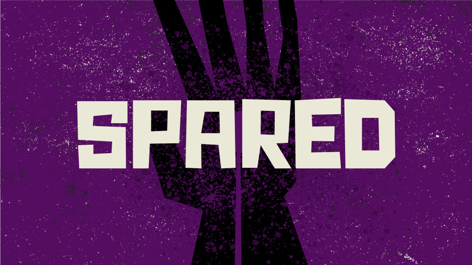 Purple background with a black hand that is bleeding. Overlaid text says "Spared."